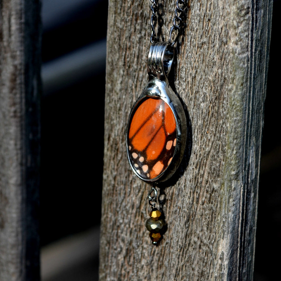 Handmade_Real_Butterfly_Wing_Oval_Long_Necklace_in_orange_and_black