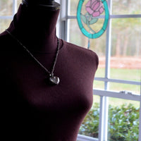 Dandelion_Heart_Necklace_shown_on_bust_for_length