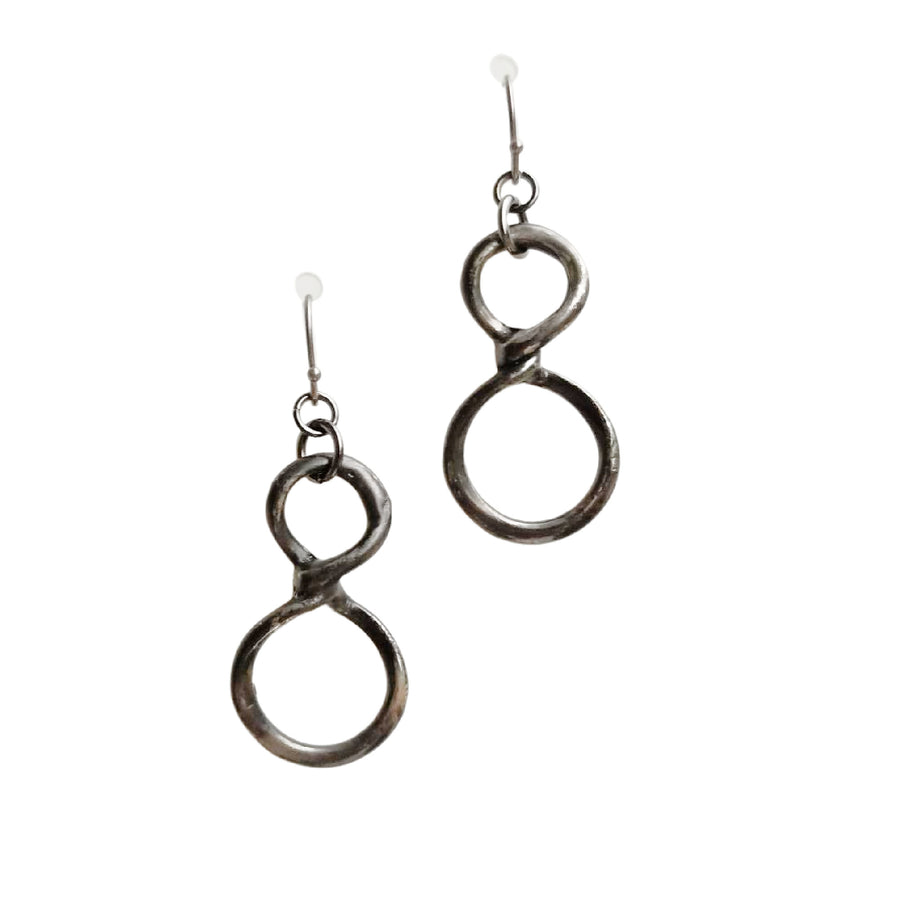 Infinity earrings created to coordinate the kaleidoscope pendant. Metal figure 8s that match the handmade kaleidoscope pendant necklace.