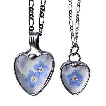 Forget me not heart pendants, one large with 2 blooms and one dainty with one bloom. Bezel is hand formed with copper and mixed silver solder by Louisiana Artisan. Hand made in USA. Mother daughter gift for mothers day.