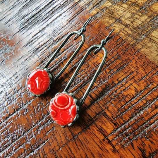 red ceramic dot earrings on copper wires, dangle earrings attached to sterling silver ear wires. Truly Hand Made In USA by Louisiana Artisan at Bayou Glass Arts Studio.