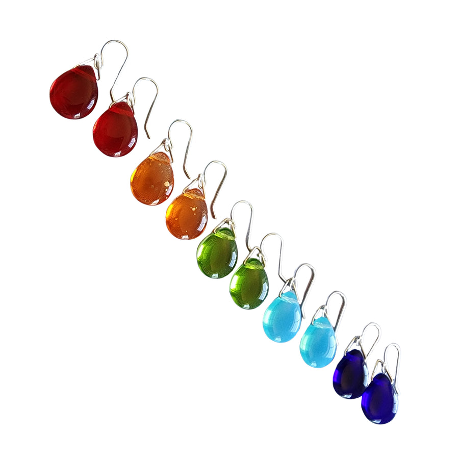 5 pairs ofHandmade Glass Drop Earrings with Hand formed Sterling Silver Ear Wires and findings in a rainbow of colors. Red, Orange, Green, Aqua and Blue.Truly Hand Made in USA by Louisiana Artisan at Bayou Glass Arts Studio.